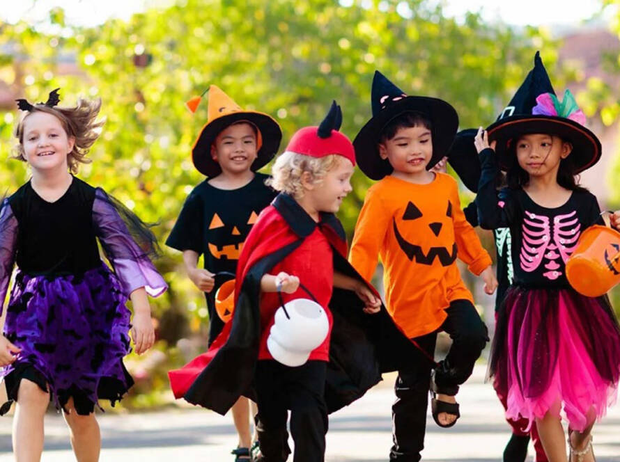 Image of Kids dressed up for Halloween and trick or treating
